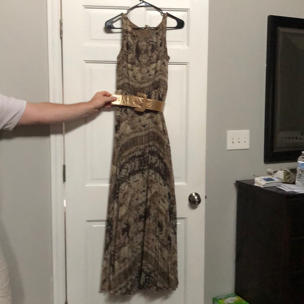 Maxi Dress in browns, blacks, and creams.